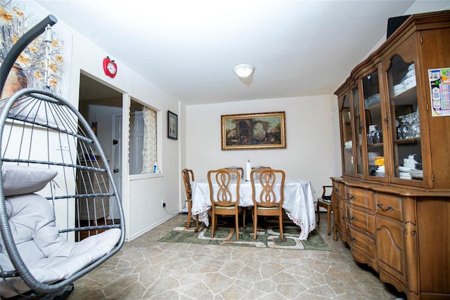 10124 78th St, Ozone Park, NY 11416 - dining space with stone flooring