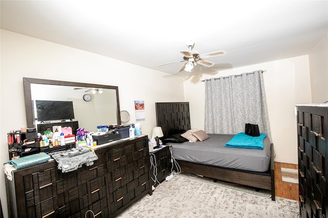 10124 78th St, Ozone Park, NY 11416 - bedroom featuring ceiling fan and light wood-style flooring