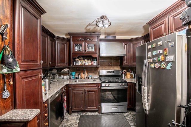 10124 78th St, Ozone Park, NY 11416 - kitchen featuring appliances with stainless steel finishes, a sink, wall chimney exhaust hood, backsplash, and light stone counters