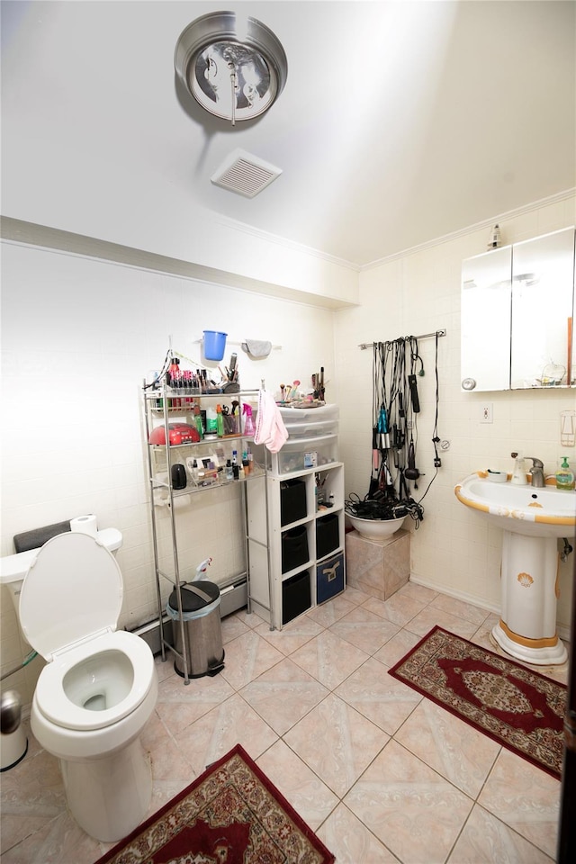 10124 78th St, Ozone Park, NY 11416 - bathroom with tile patterned floors and toilet