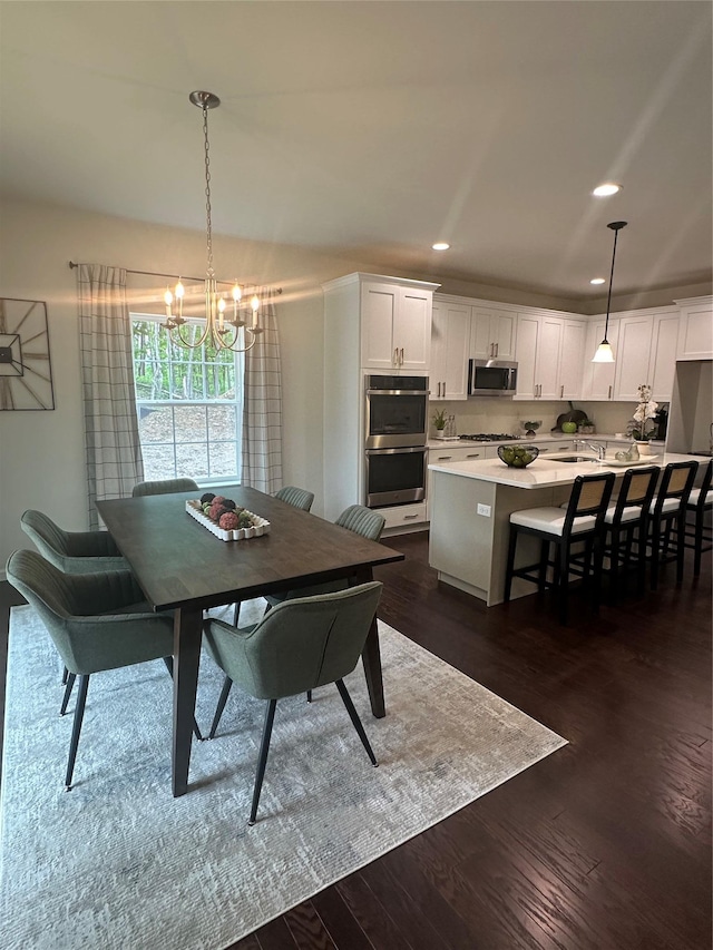 39 Hackensack Heights Rd, Wappingers Falls, NY 12590 - dining room featuring a chandelier, recessed lighting, and dark wood-style flooring
