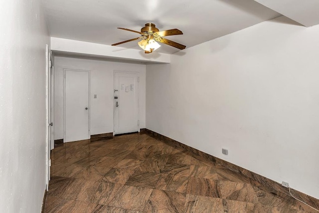 87-40 Francis Lewis Blvd Unit B38, Queens Village, NY 11427 - empty room featuring dark stone finish flooring and ceiling fan
