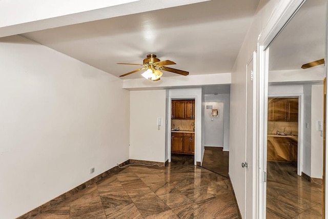 87-40 Francis Lewis Blvd Unit B38, Queens Village, NY 11427 - unfurnished bedroom with baseboards and a ceiling fan