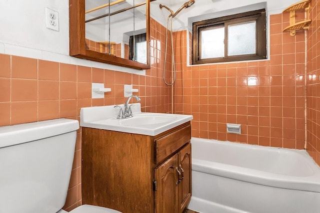 87-40 Francis Lewis Blvd Unit B38, Queens Village, NY 11427 - full bathroom featuring toilet, vanity, tile walls, and tub / shower combination
