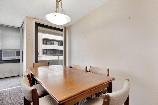 dining room with carpet, cooling unit, and baseboard heating