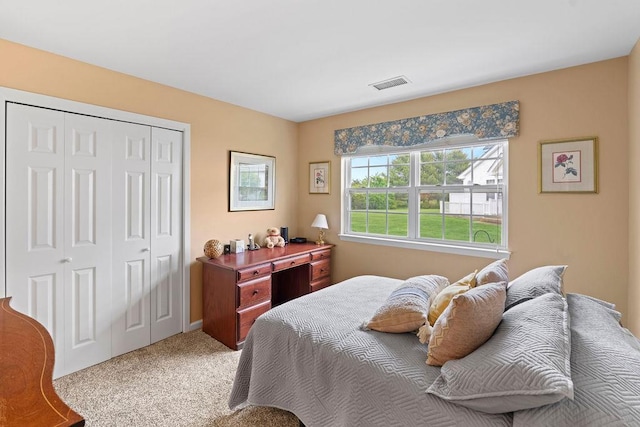43 Summerfield Ln N Unit 43, Aquebogue, NY 11901 - carpeted bedroom with a closet and baseboards