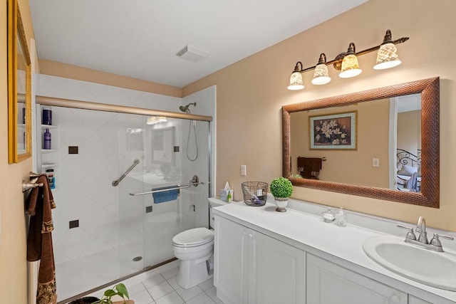 43 Summerfield Ln N Unit 43, Aquebogue, NY 11901 - bathroom with toilet, tile patterned floors, a stall shower, and vanity
