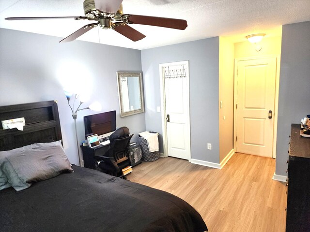 300 High Point Dr Unit 514, Hartsdale, NY 10530 - bedroom featuring light wood-type flooring, baseboards, and ceiling fan