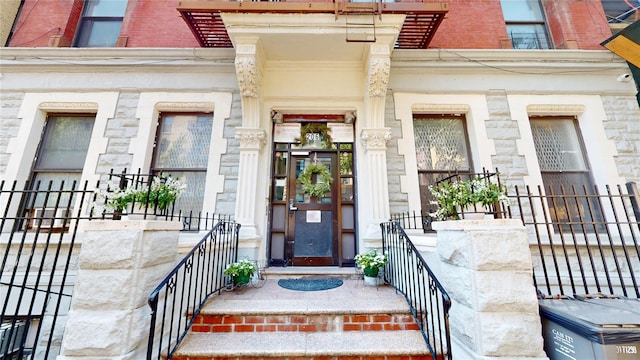 206 W 121st St Unit C, New York Manhattan, NY 10027 - doorway to property with stone siding and covered porch