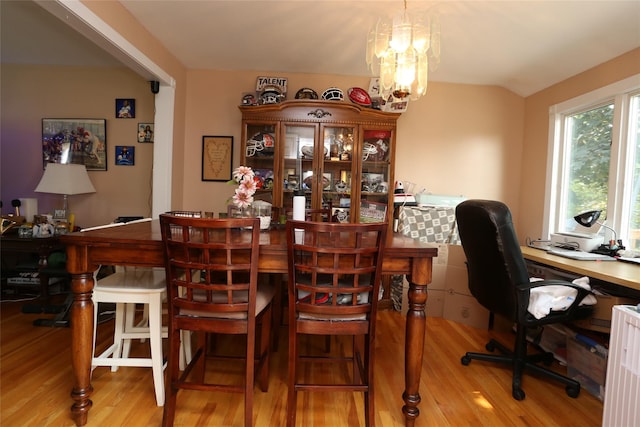 4 Rosemont Dr, New City, NY 10956 - dining area featuring wood finished floors, a chandelier, and a desk