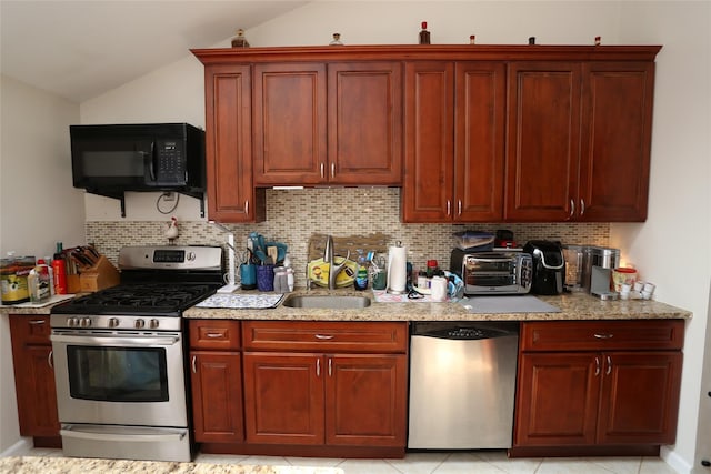 4 Rosemont Dr, New City, NY 10956 - kitchen with appliances with stainless steel finishes, lofted ceiling, a sink, backsplash, and dark brown cabinets