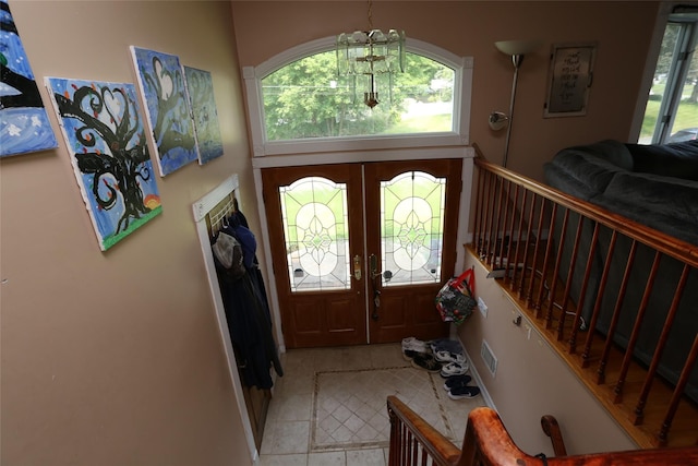 4 Rosemont Dr, New City, NY 10956 - foyer with healthy amount of natural light, stairs, and french doors