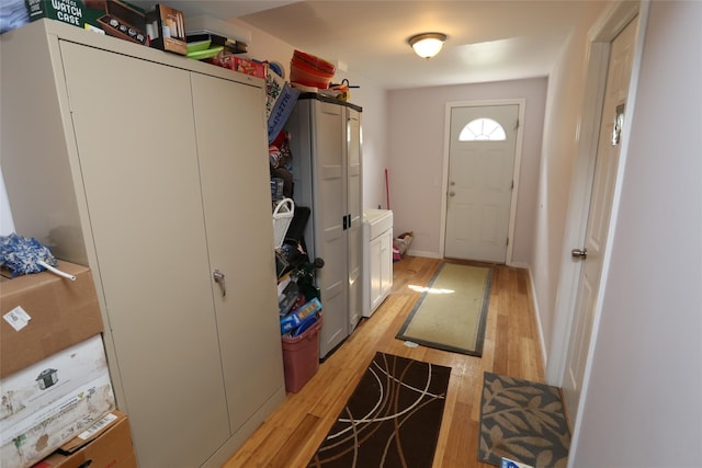 4 Rosemont Dr, New City, NY 10956 - entryway featuring independent washer and dryer and light wood-style flooring