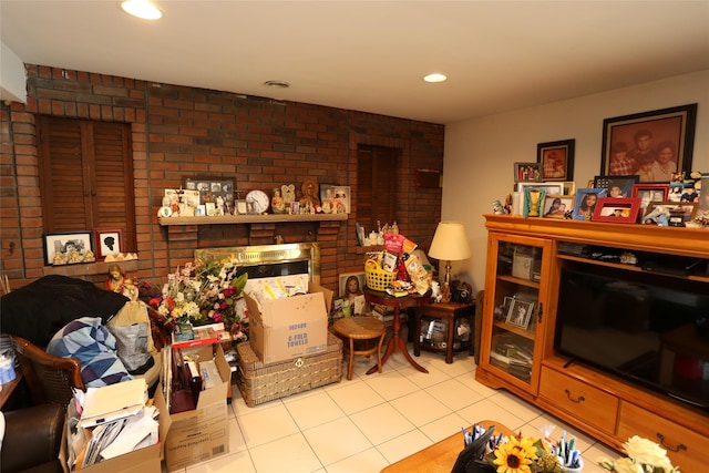 4 Rosemont Dr, New City, NY 10956 - living area with light tile patterned floors, brick wall, and recessed lighting