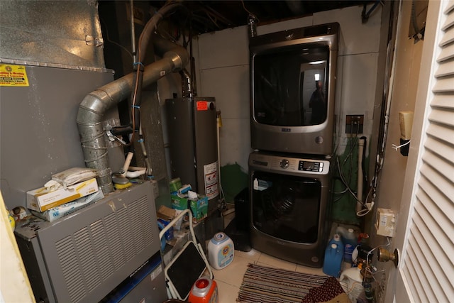 4 Rosemont Dr, New City, NY 10956 - washroom with stacked washer / drying machine, water heater, heating unit, and tile patterned flooring