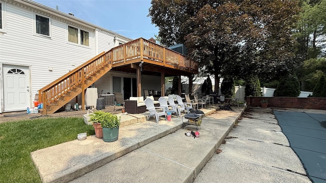 4 Rosemont Dr, New City, NY 10956 - rear view of property with stairway, a deck, a patio area, and central AC