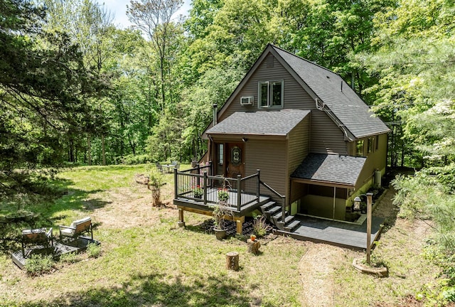 3 Hilltop Rd, Poughkeepsie, NY 12601 - view of home's exterior with a shingled roof, a deck, a lawn, and a view of trees