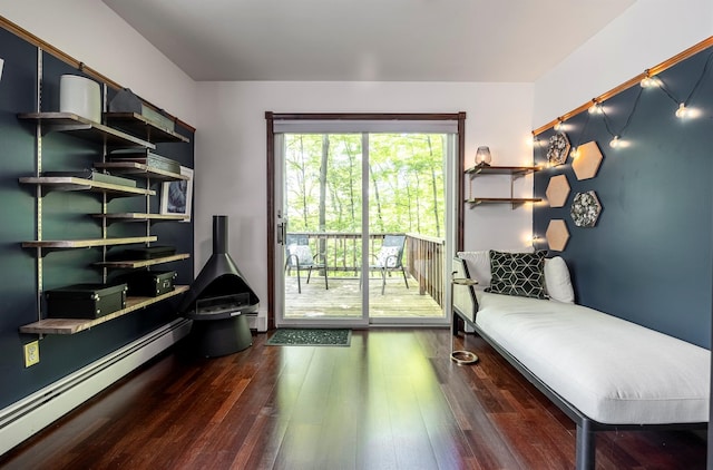 3 Hilltop Rd, Poughkeepsie, NY 12601 - sitting room with a baseboard heating unit and wood finished floors