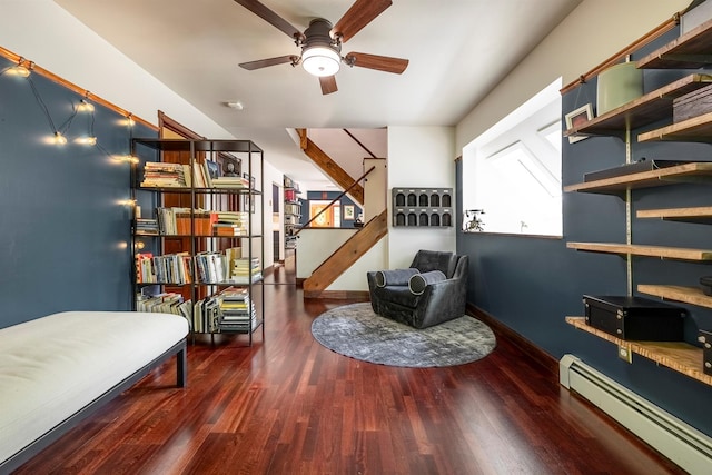 3 Hilltop Rd, Poughkeepsie, NY 12601 - sitting room featuring baseboard heating, ceiling fan, wood finished floors, and stairway