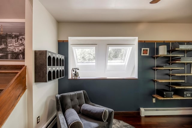 3 Hilltop Rd, Poughkeepsie, NY 12601 - sitting room featuring a baseboard heating unit, wood finished floors, and a baseboard radiator