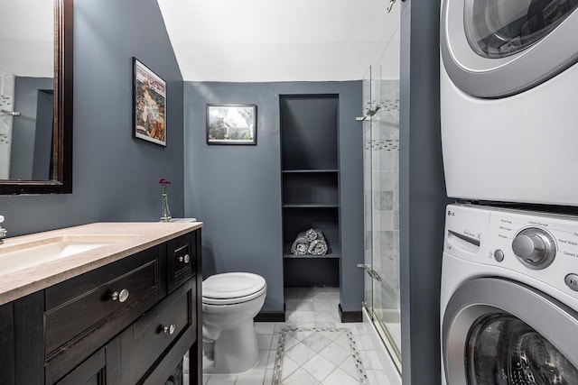 3 Hilltop Rd, Poughkeepsie, NY 12601 - full bathroom with stacked washer / dryer, a shower stall, vanity, toilet, and tile patterned flooring