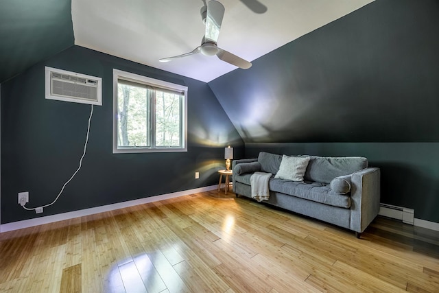 3 Hilltop Rd, Poughkeepsie, NY 12601 - sitting room with baseboard heating, ceiling fan, a wall mounted AC, vaulted ceiling, and light wood-style flooring