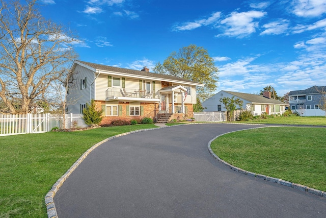 146 Awixa Ave, Bay Shore, NY 11706 - bi-level home featuring brick siding, a chimney, a gate, and driveway