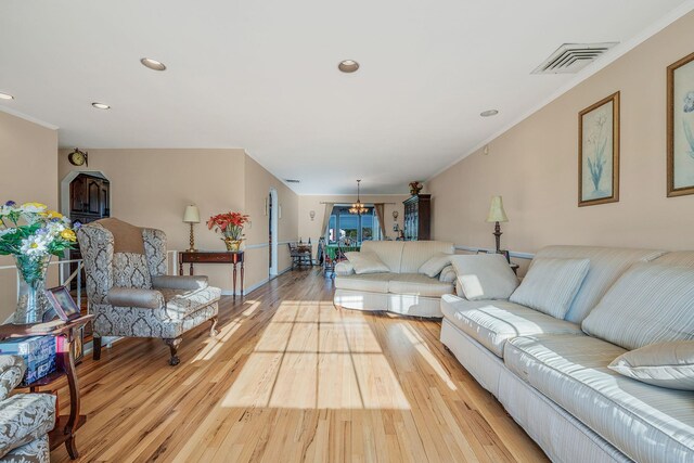 146 Awixa Ave, Bay Shore, NY 11706 - living area featuring wood finished floors, recessed lighting, and ornamental molding