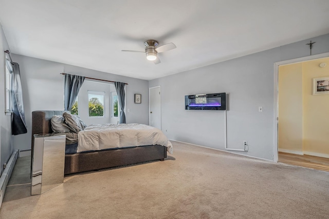 146 Awixa Ave, Bay Shore, NY 11706 - bedroom featuring carpet flooring, ceiling fan, baseboards, and baseboard heating