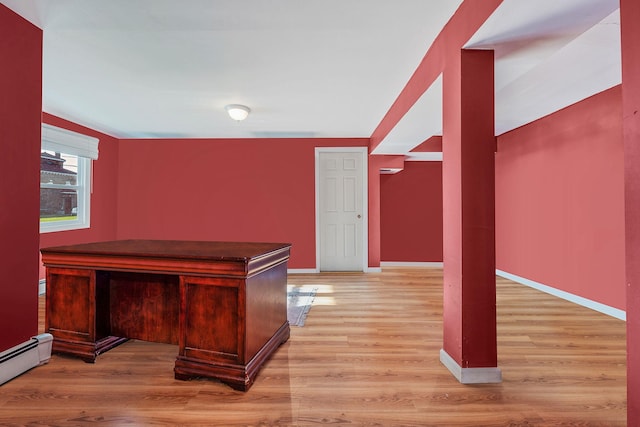 146 Awixa Ave, Bay Shore, NY 11706 - unfurnished office with a baseboard heating unit, light wood-type flooring, and baseboards