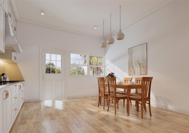 146 Awixa Ave, Bay Shore, NY 11706 - dining space with light wood-style floors and crown molding