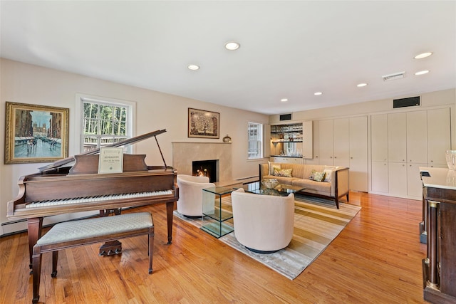 50 Burnside Dr, Hastings-On-Hudson, NY 10706 - living area with light wood-type flooring, a premium fireplace, and recessed lighting