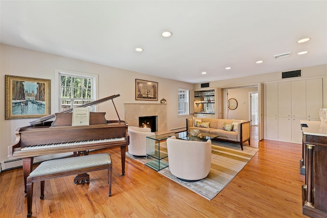 50 Burnside Dr, Hastings-On-Hudson, NY 10706 - living area featuring light wood-style flooring, recessed lighting, and a high end fireplace