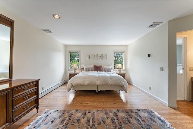 50 Burnside Dr, Hastings-On-Hudson, NY 10706 - bedroom with a baseboard radiator, light wood-style floors, and recessed lighting
