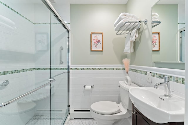 50 Burnside Dr, Hastings-On-Hudson, NY 10706 - bathroom with baseboard heating, tile patterned floors, vanity, a stall shower, and tile walls