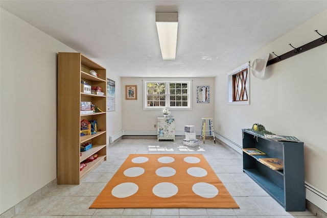 50 Burnside Dr, Hastings-On-Hudson, NY 10706 - sitting room featuring baseboard heating and light tile patterned floors