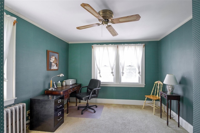 home office featuring radiator, ornamental molding, ceiling fan, carpet floors, and baseboards