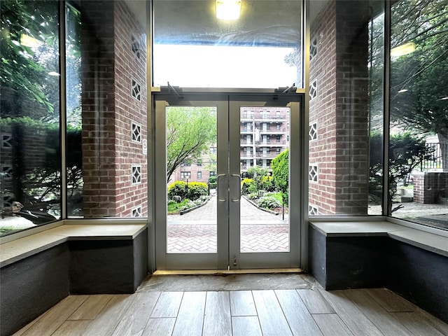 270 N Broadway Unit 2Hi, Yonkers, NY 10701 - doorway with hardwood / wood-style flooring, plenty of natural light, and french doors