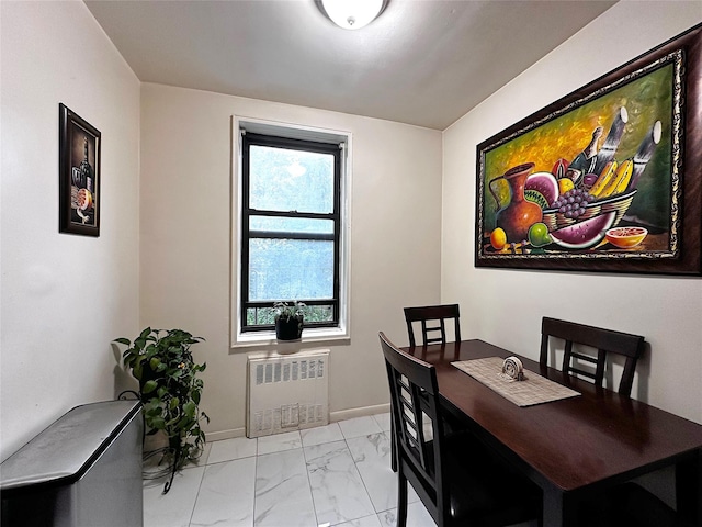 270 N Broadway Unit 2Hi, Yonkers, NY 10701 - dining room with radiator heating unit and light marble finish flooring