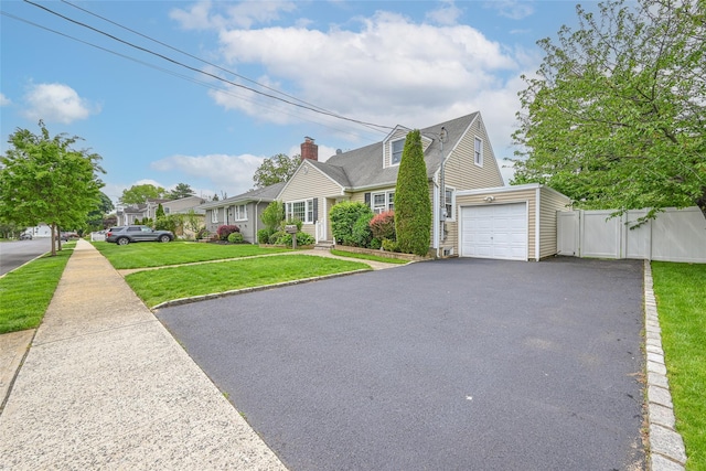 1652 Baker Ave, Merrick, NY 11566 - view of front of home with driveway and a garage