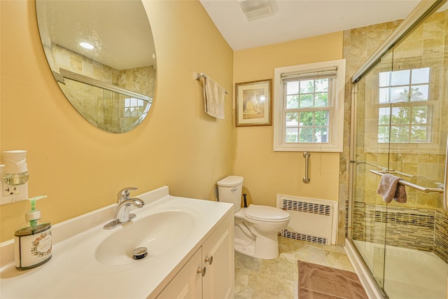 1652 Baker Ave, Merrick, NY 11566 - bathroom with radiator, toilet, vanity, and a shower stall