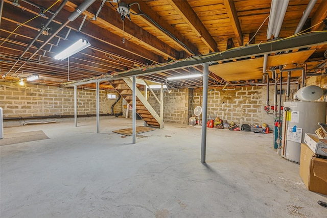 1652 Baker Ave, Merrick, NY 11566 - unfinished below grade area featuring water heater and stairway