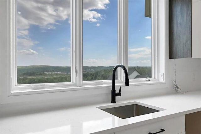 18 Pullman Rte, Monroe, NY 10950 - kitchen featuring a sink, light countertops, and modern cabinets