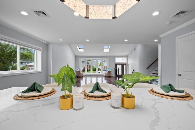 3161 Grand Ave, Baldwin Harbor, NY 11510 - living area with recessed lighting, stairway, ornamental molding, and a skylight