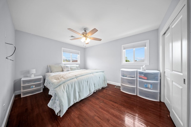 3161 Grand Ave, Baldwin Harbor, NY 11510 - bedroom with wood finished floors, baseboards, a closet, and a ceiling fan