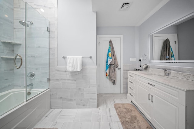 3161 Grand Ave, Baldwin Harbor, NY 11510 - bathroom with tile walls, enclosed tub / shower combo, vanity, and wainscoting