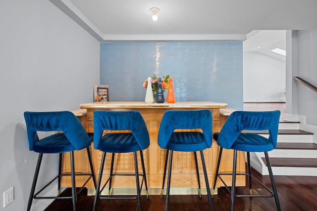 3161 Grand Ave, Baldwin Harbor, NY 11510 - indoor dry bar with wood finished floors and baseboards