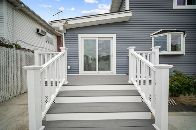 3161 Grand Ave, Baldwin Harbor, NY 11510 - wooden deck with fence and an AC wall unit