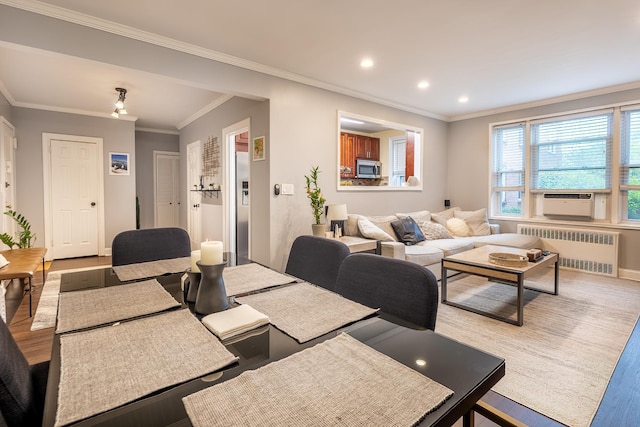 101 Old Mamaroneck Rd Unit 1B1, White Plains, NY 10605 - dining space featuring radiator, light wood finished floors, ornamental molding, baseboards, and recessed lighting