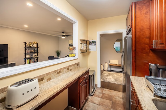 101 Old Mamaroneck Rd Unit 1B1, White Plains, NY 10605 - kitchen featuring freestanding refrigerator, a ceiling fan, light stone counters, and recessed lighting